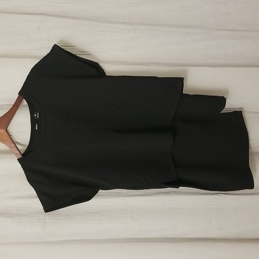 Betabrand modern asymmetric skirt and top.  Very modern and hip.
